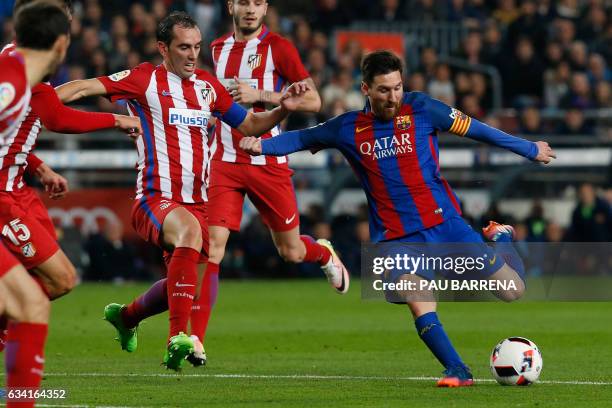 Barcelona's Argentinian forward Lionel Messi kicks the ball during the Spanish Copa del Rey semi final second leg football match FC Barcelona vs Club...