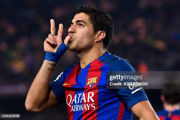 Barcelona's Uruguayan forward Luis Suarez celebrates after scoring the opener during the Spanish Copa del Rey semi final second leg football match FC...