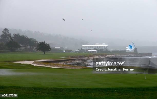 Heavy rain and strong winds hammer the 18th hole allong the coast during a practie round for the AT&T Pebble Beach National Pro-Am at Pebble Beach...