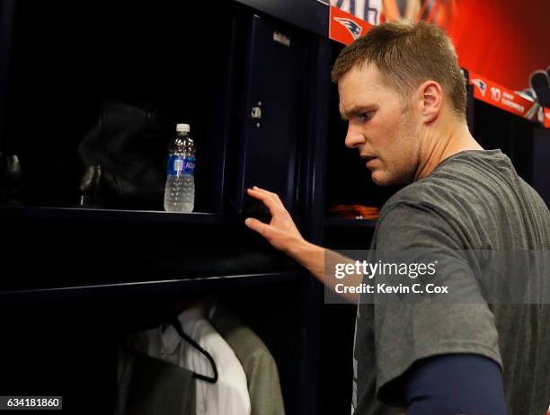 Tom Brady of the New England Patriots reacts in the locker room after defeating the Atlanta Falcons during Super Bowl 51 at NRG Stadium on February...