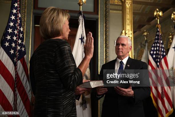 Betsy DeVos participates in a swearing-in ceremony, officiated by Vice President Mike Pence , at the Vice President's ceremonial office at Eisenhower...