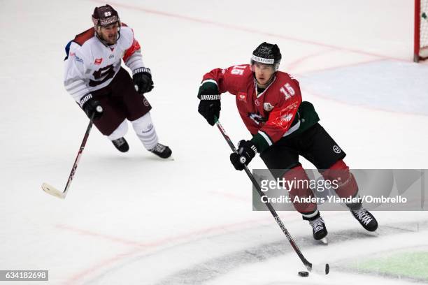 Matt Donovan skates with the puck during the Champions Hockey League Final between Frolunda Gothenburg and Sparta Prague at Frolundaborgs Isstadion...