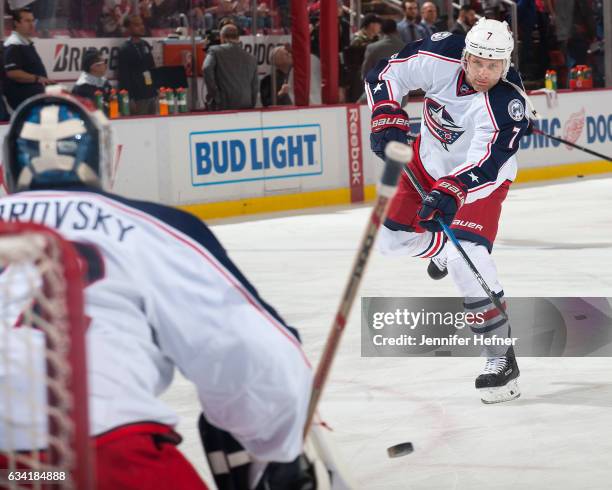 Jack Johnson of the Columbus Blue Jackets shoots the puck on goalie Sergei Bobrovsky during pre-game warm ups before an NHL game against the Detroit...