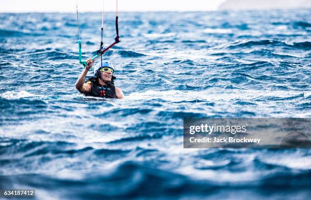 Former President Barack Obama kitesurfs at Richard Branson's Necker Island retreat on January 29, 2017 in the British Virgin Islands. Former...