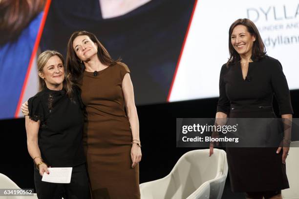 Dyllan McGee, founder and executive producer of MAKERS, from left, hugs Sheryl Sandberg, billionaire and chief operating officer of Facebook Inc., as...