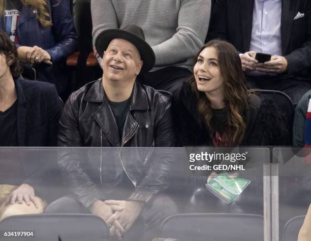Jeffrey Ross and Sophie Simmons attend Anaheim Ducks Vs. New York Rangers game at Madison Square Garden on February 7, 2017 in New York City.