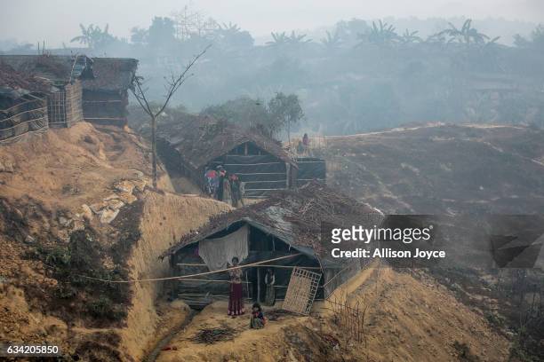 Mist hangs in the air above Kutapalong Rohingya refugee camp on February 8, 2017 in Cox's Bazar, Bangladesh. The United Nations estimates about...