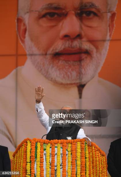 Indian Prime Minister Narendra Modi and Bharatiya Janata Party leader gestures as he addresses a state assembly election rally in Ghaziabad on...
