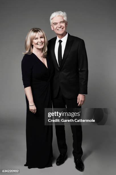 Tv presenter is Phillip Schofield is photographed with his wife Stephanie Lowe at the National Television Awards on January 25, 2017 in London,...