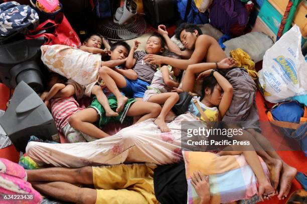 Fire victims stayed and take a temporary shelter at Delpan Sports Complex in Delpan, Manila City on Feb. 8, 2017. More than 1,100 houses and more...