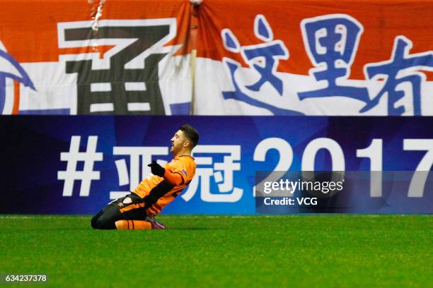 Brandon Borrello of Brisbane Roar celebrates after scoring his team's first goal during the AFC Champions League 2017 play-off match between Shanghai...