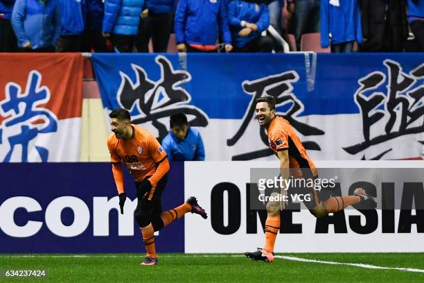 Brandon Borrello of Brisbane Roar celebrates after scoring his team's first goal during the AFC Champions League 2017 play-off match between Shanghai...