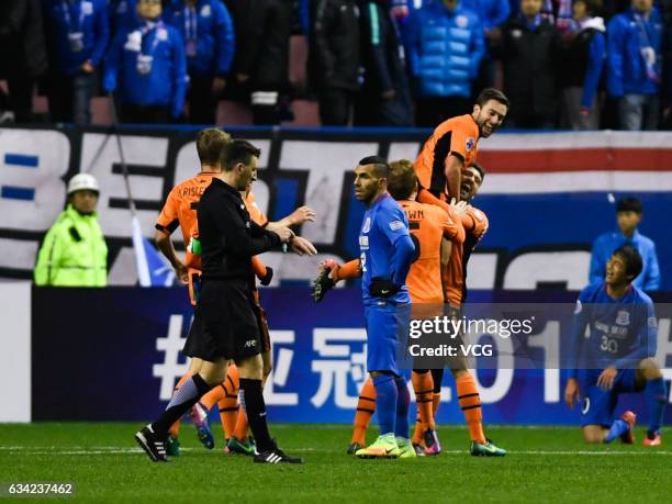 Tommy Oar of Brisbane Roar celebrates with team mates after scoring his team's second goal during the AFC Champions League 2017 play-off match...