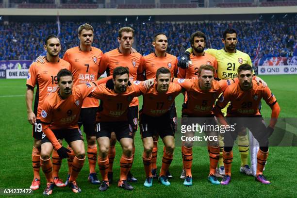 Brisbane Roar players line up prior to the AFC Champions League 2017 play-off match between Shanghai Shenhua and Brisbane Roar at Hongkou Stadium on...