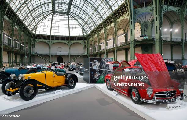 An Aston Martin 1,5 litre Standard Sports model 1928 and a Mercedes-Benz 300 SL "Butterfly" 1955 are displayed during a press preview before a mass...