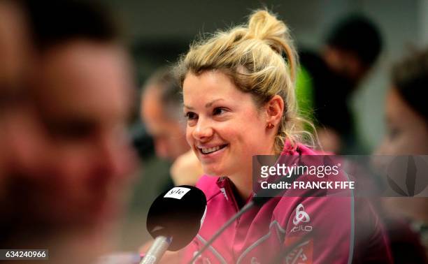France's Marie Dorin Habert smiles during a press conference ahead of the 2017 FIS Biathlon World Championships in Hochfilzen on February 7, 2017. /...