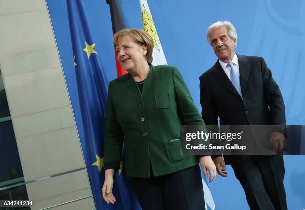 German Chancellor Angela Merkel and Uruguayan President Tabare Vazquez depart after speaking to the media following talks at the Chancellery on...
