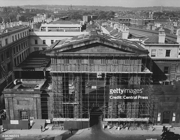 Demolition begins on the Euston Arch, a Doric propylaea at the entrance to Euston Station in London, UK, 5th October 1961. It is being dismantled as...