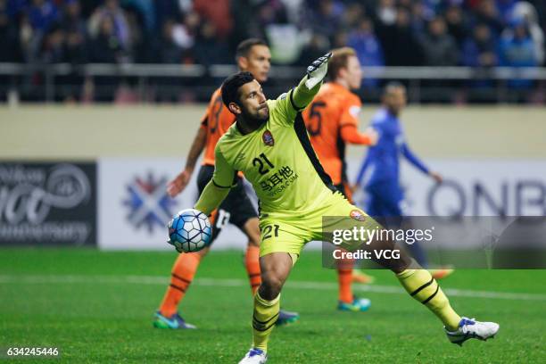 Goalkeeper Jamie Young of Brisbane Roar throws the ball during the AFC Champions League 2017 play-off match between Shanghai Shenhua and Brisbane...