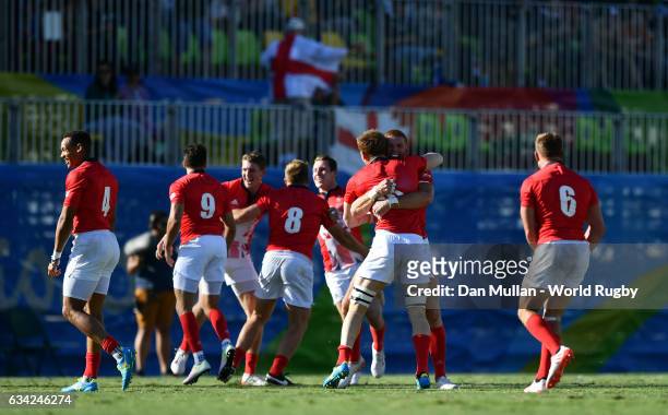 Great Britain players celebrate victory at the final whistle during the Men's Rugby Sevens semi final match between Great Britain and South Africa on...