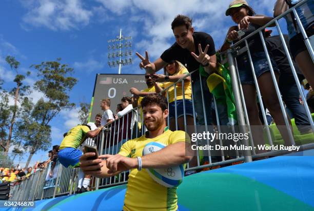 Gustavo Albuquerque of Brazil poses for a picture with fans following during the Men's Rugby Sevens placing match between Brazil and Kenya on day six...