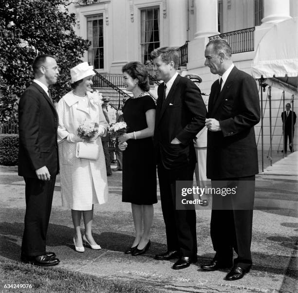 President John Fitzgerald Kennedy , his wife Jacqueline , US vice-president Lyndon B. Johnson welcome US astronaut Alan Shepard and his wife Louise...