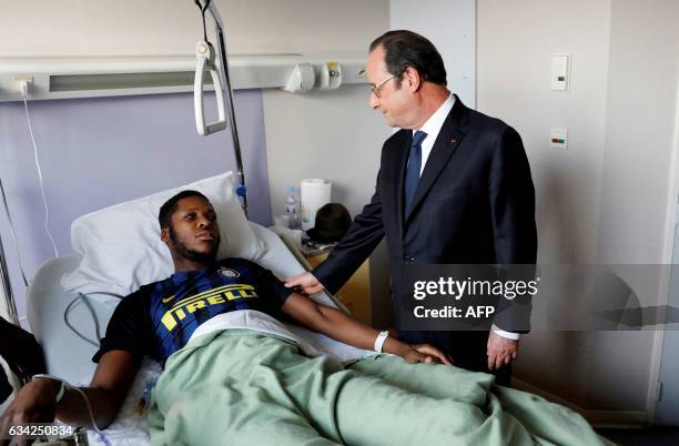 In this picture taken on February 7, 2017 at the Robert Ballanger in Aulnay-sous-Bois suburban Paris, French President Francois Hollande visits a...