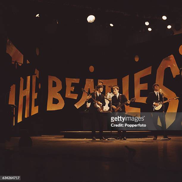 English pop group The Beatles pictured during rehearsals the day before the band's first appearance on The Ed Sullivan Show at CBS's Studio 50 in New...