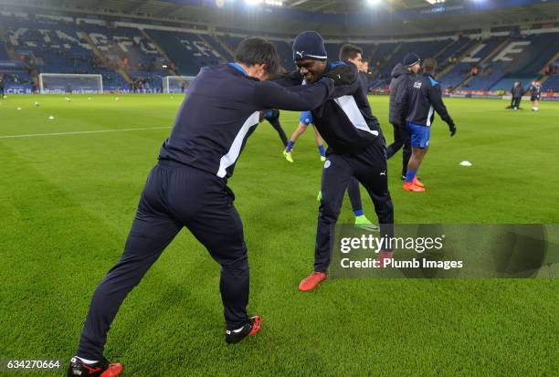 Shinji Okazaki and Daniel Amartey of Leicester City warm up at King Power Stadium ahead of the Emirates FA Cup Fourth Round Replay match between...