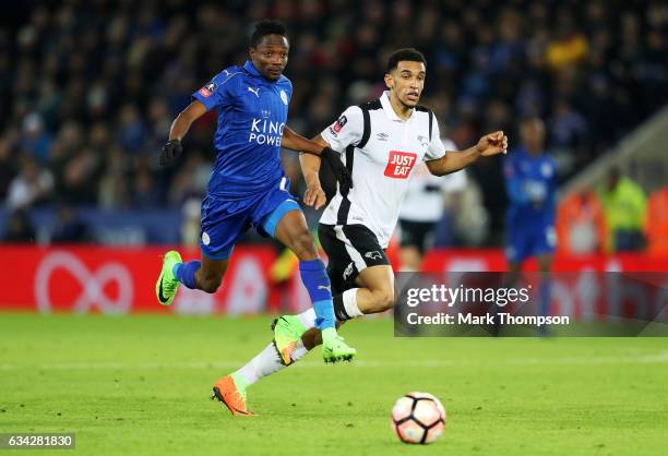 Ahmed Musa of Leicester City battles for the ball with Nick Blackman of Derby County during the Emirates FA Cup Fourth Round replay match between...