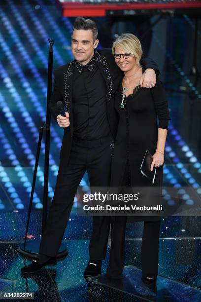 Robbie Williams and Maria De Filippi attend the second night of the 67th Sanremo Festival 2017 at Teatro Ariston on February 8, 2017 in Sanremo,...