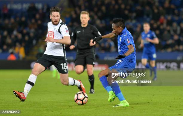 Ahmed Musa of Leicester City in action with Jason Butterfield of Derby County during the Emirates FA Cup Fourth Round Replay match between Leicester...