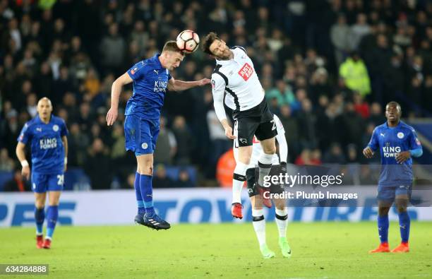 Andy King of Leicester City in action with David Nugent of Derby County during the Emirates FA Cup Fourth Round Replay match between Leicester City...