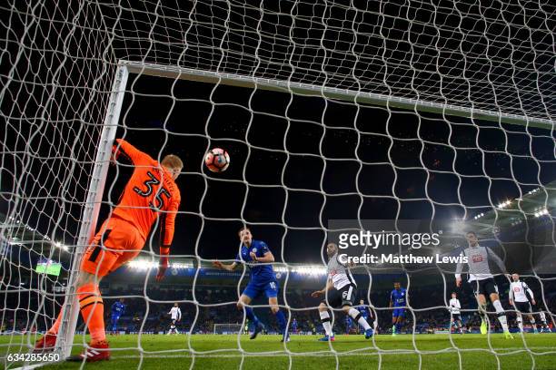 Andy King of Leicester City scores the opening goal past Jonathan Mitchell of Derby County during the Emirates FA Cup Fourth Round replay match...