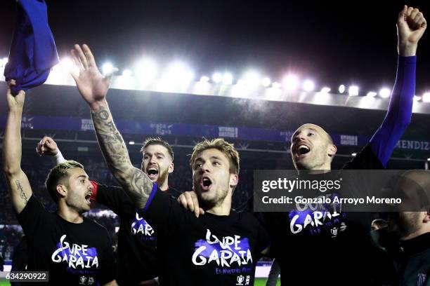 Marcos Llorente of Deportivo Alaves celebrates their victory with teammates goalkeeper Adrian Ortola , Kiko Femenia and Gaizka Toquero after the Copa...