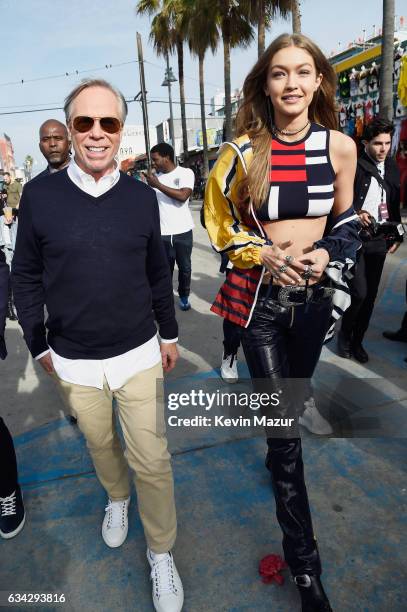 Fashion designer Tommy Hilfiger and model Gigi Hadid attend the TommyLand Tommy Hilfiger Spring 2017 Fashion Show on February 8, 2017 in Venice,...