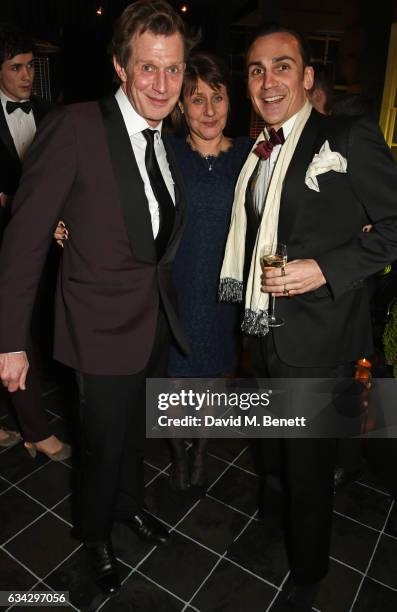 Jason Flemyng, Lucinda Syson and Henry Lloyd-Hughes attend the dunhill and Dylan Jones pre-BAFTA dinner and cocktail reception celebrating Gentlemen...