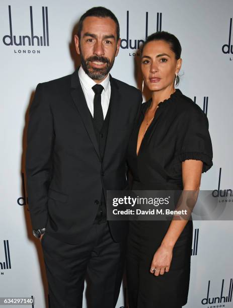 Robert Pires and Jessica Lemarie attend the dunhill and Dylan Jones pre-BAFTA dinner and cocktail reception celebrating Gentlemen in Film at Bourdon...