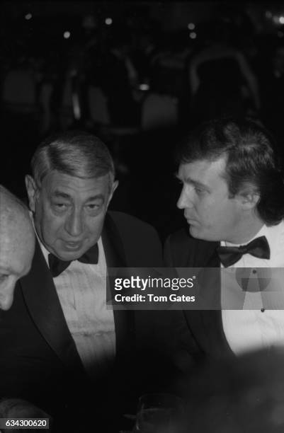 Television personality Howard Cosell and businessman Donald Trump attend the Boys Town of Italy Ball at the Waldorf-Astoria Hotel in April 1984 in...