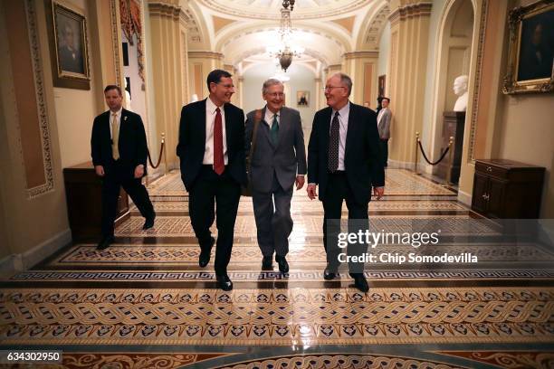 Sen. John Barrasso , Senate Majority Leader Mitch McConnell and Sen. Lamar Alexander walk thorugh the U.S. Captiol after the Senate confirmed Sen....