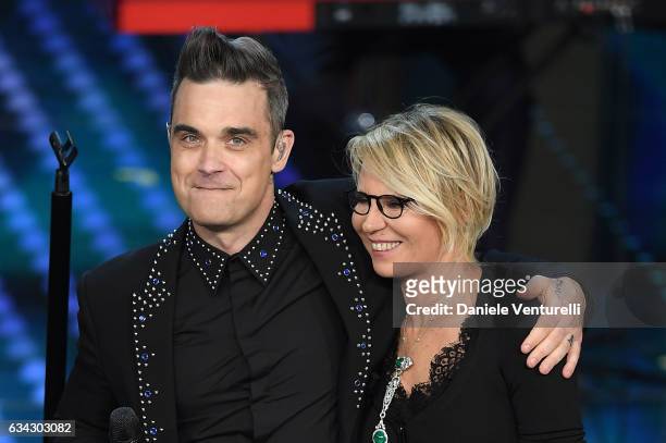 Robbie Williams and Maria De Filippi attend 67. Sanremo Festival at Teatro Ariston on February 8, 2017 in Sanremo, Italy.