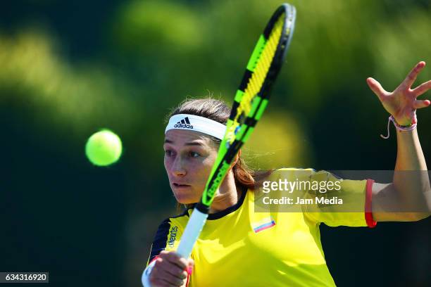 Mariana Duque of Colombia takes a shot during the third day of the Tennis Fed Cup, American Zone Group 1 at Club Deportivo La Asuncion, on February...