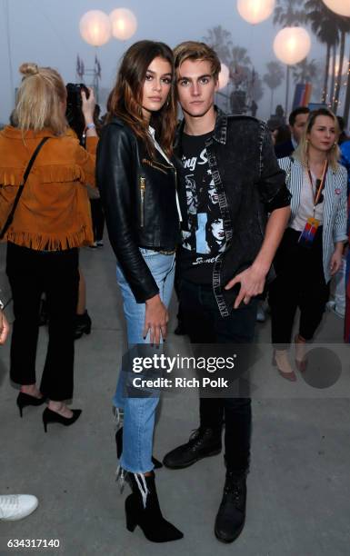 Kaia Jordan Gerber and Presley Walker Gerber at the TommyLand Tommy Hilfiger Spring 2017 Fashion Show on February 8, 2017 in Venice, California.