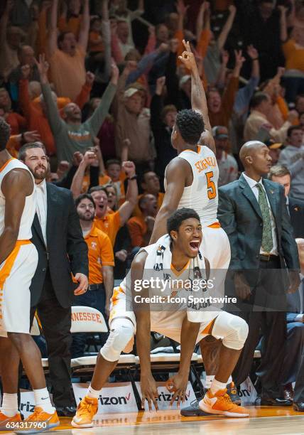 The Tennessee Volunteers bench and crowd celebrate after after Tennessee Volunteers guard Jordan Bowden hits a 3 point shot during a game between the...