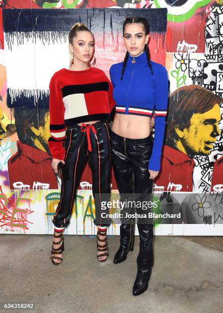 Models Delilah Hamlin and Amelia Hamlin attend the TommyLand Tommy Hilfiger Spring 2017 Fashion Show on February 8, 2017 in Venice, California.