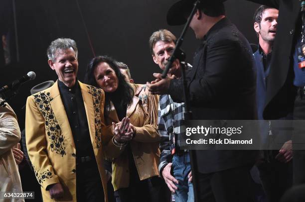 Randy Travis and Mary Travis perform during 1 Night. 1 Place. 1 Time: A Heroes & Friends Tribute to Randy Travis at Bridgestone Arena on February 8,...