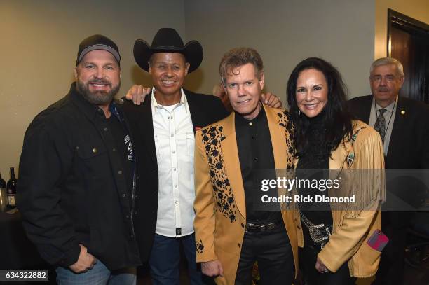 Garth Brooks, Neal McCoy, Randy Travis, and Mary Travis pose backstage during 1 Night. 1 Place. 1 Time: A Heroes & Friends Tribute to Randy Travis at...