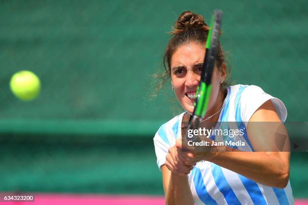 Catalina Pella of Argentina takes a shot during the third day of the Tennis Fed Cup, American Zone Group 1 at Club Deportivo La Asuncion, on February...