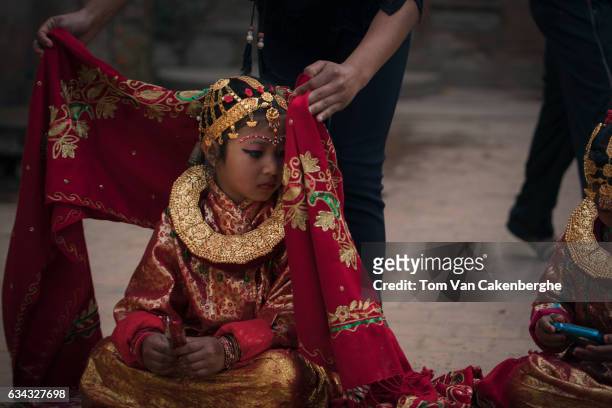 Young Nepalese girls dressed up as brides take part in the Bel Bibaha ritual, celebrated by the Newari ethnicity, indigenous to the Kathmandu Valley...