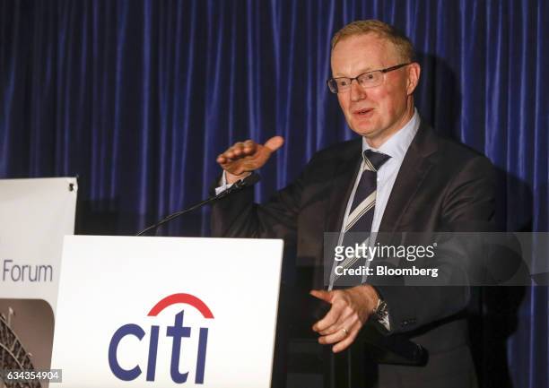 Philip Lowe, governor of the Reserve Bank of Australia, gestures as he speaks at the A50 Australian Economic Forum Dinner in Sydney, Australia, on...